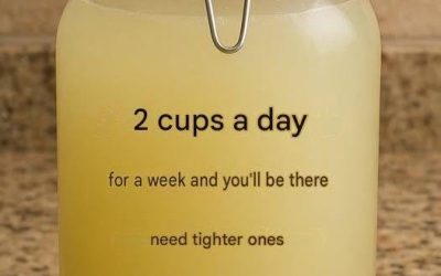 Natural slimming drink: warm water, apple cider vinegar, ginger and lemon